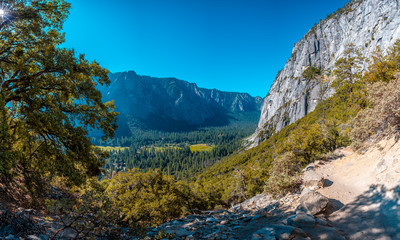 Fototapeta na wymiar Panoramic taken during trekking on the route from Upper Yosemite Fall to Yosemite Point. California, United States