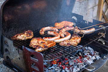 Barbecue with filet steak meat on a charcoal grill. Grilled food concept.