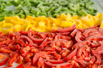 Peppers slices frozen of three colors 