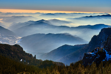 Aerial Landscape view from Ceahlău Mountains National Park at sunset in winter season,Sunset in Ceahlau Mountains