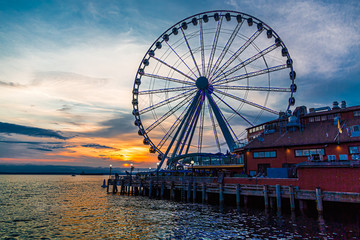 The ferris wheel on the waterfront of Seattle, Washington in late afternoon light