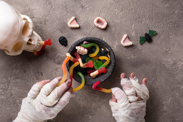 Halloween background with mummy hand