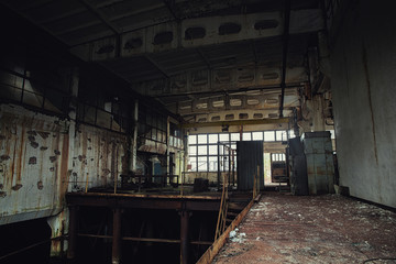 Dark industrial interior of factory