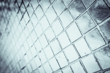 Beautiful closeup textures abstract color black and white tiles granite and light blue glass pattern wall and background and art