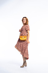 Beautyfull woman in Studio in Modern autum fashion