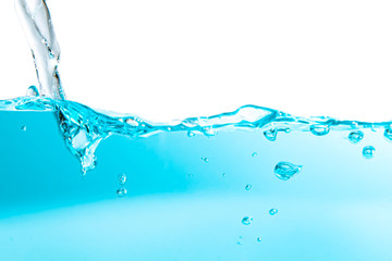 Fototapeta na wymiar Close up blue water splash with copy space.