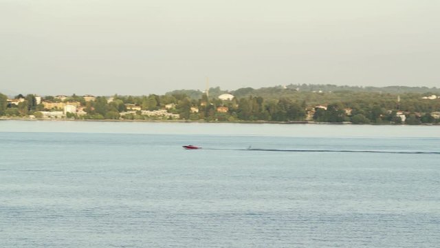 Speedboat and water ski on Lake Maggiore in Italy