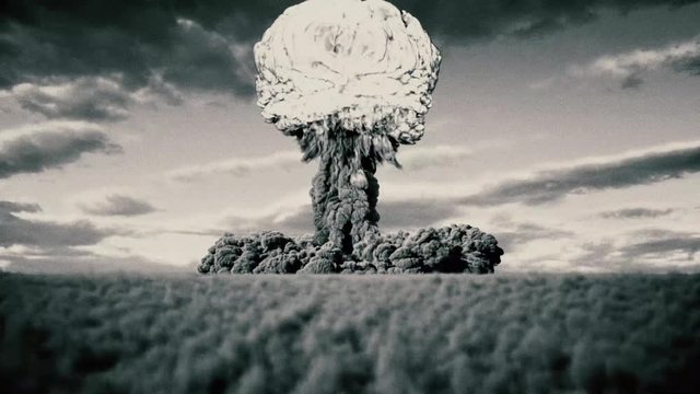 Black and white film look nuclear bomb test with a giant shockwave hitting camera
