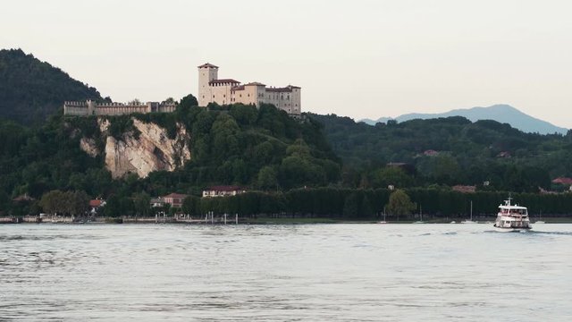 Lake Maggiore view on Rocca di Angera and the city of Angera from a boat