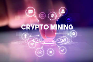 Finger touching tablet with web technology icons and CRYPTO MINING inscription, web technology concept