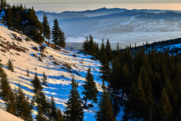 Amazing sunrise view from Ceahlău Mountains National in winter season, Winter Landscape in National Park Ceahlau