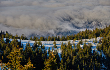 Aerial Landscape view from Ceahlău Mountains National Park at sunset in winter season,Sunset in Ceahlau Mountains