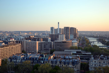 Fototapeta na wymiar Paris, France - april 19th 2015 : aerial view of Paris. Focus on Beaugrenelle center shop on sunset.