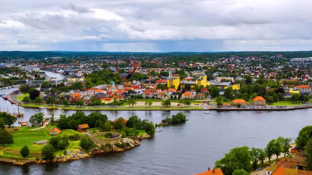 Fredrikstad, Norway. Aerial view of Glomma river in Fredrikstad, Norway with famous landmarks like Isegran Fort. Time-lapse with moving boats and clouds, panning video