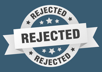 rejected ribbon. rejected round white sign. rejected