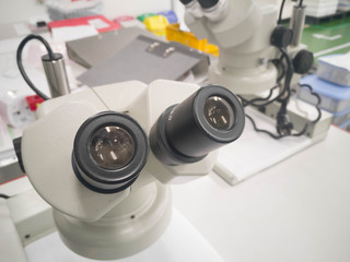 Microscope on the table use in factory