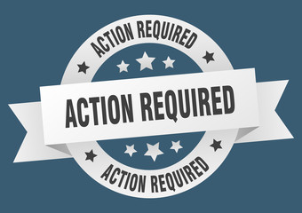 action required ribbon. action required round white sign. action required