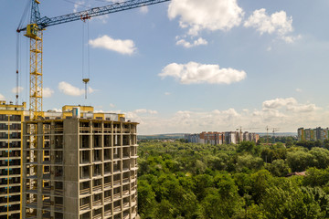 Fototapeta premium Apartment or office tall concrete building under construction.