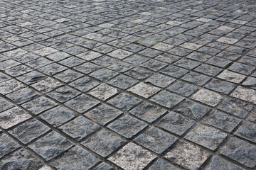 Fototapeta premium Ancient Roman Square Stone Road Low Angle Closeup