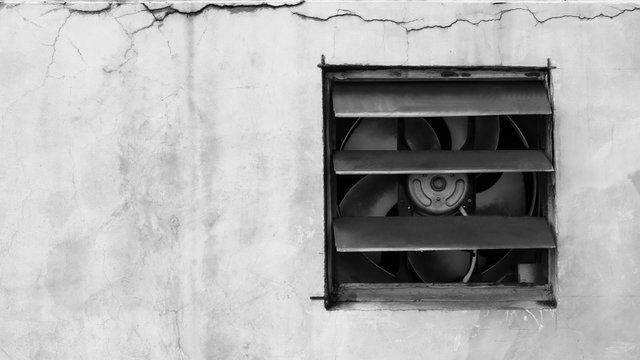 Air exhauster on crack concrete wall texture background.