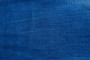 Macro, Close-up of texture details of denim blue jeans. Pattern of fabric or textile is abstract background. Concept design  fashion and retro stlye.