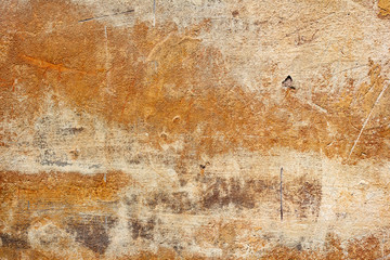 Texture of a concrete wall with cracks and scratches which can be used as a background