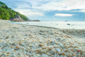 Fototapeta na wymiar Empty and tranquil beach on the Malaysian tropical paradise Perhentian Islands during sunset
