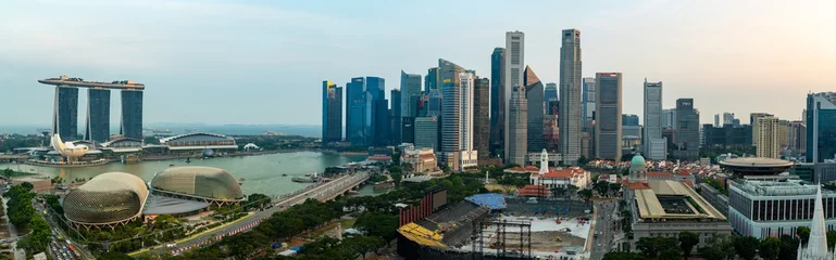 Fotobehang Super wide angle image of Singapore skyscrapers before sunset © hit1912