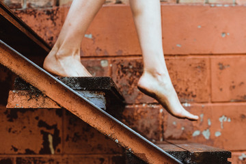 feet go down the stairs