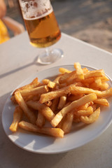 french fries and a beer as a starter