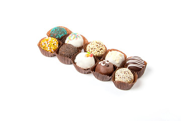 Different belgian truffle candies set isolated on white background