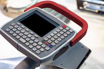 Fototapeta premium Shock-point portable marker. Markirator Equipment for stamping inscriptions on metal. Electronic metal marker. Drawing marking by shock method. Engraving on metal. Metalworking equipment.
