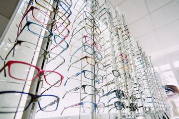 Stand with glasses in the store of optics