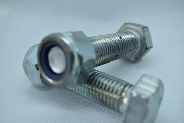 A pair of industrial strength nuts and bolts.