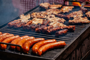 delicious grilled meat and bratwurst sausage and steak