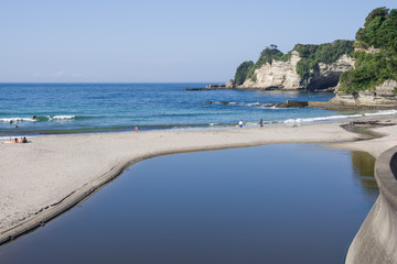 Ubara, Chiba, Japan , 09/01/2019 , river that flows over the sea on Ubara beach.