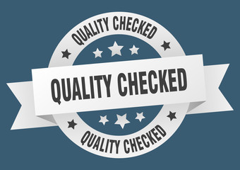 quality checked ribbon. quality checked round white sign. quality checked