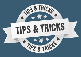 tips & tricks ribbon. tips & tricks round white sign. tips & tricks