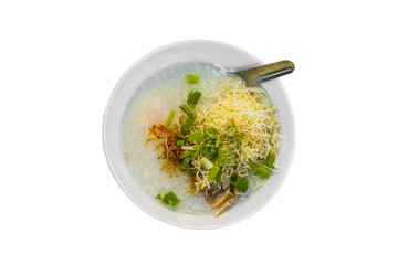 Rice congee with minced pork, boiled egg and vegetable in white ceramic bowl isolate on white background with clipping path.