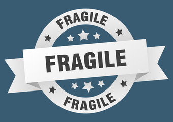 fragile ribbon. fragile round white sign. fragile