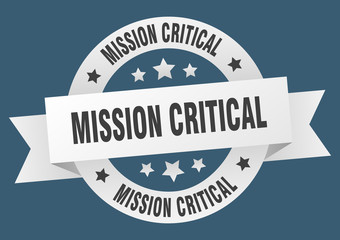 Obraz premium mission critical ribbon. mission critical round white sign. mission critical