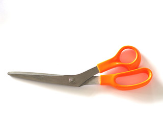 stainless steel Scissors handle is made of plastic orange color on white background