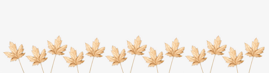 Autumn composition. Autumn maple golden leaves on white background. Flat lay, top view, copy space