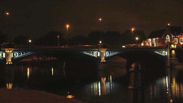 Time Lapse Of Trent Bridge Nottingham City At Night Time. British Tram Line. Traffic At Night Time. Busy Area. Street Lights