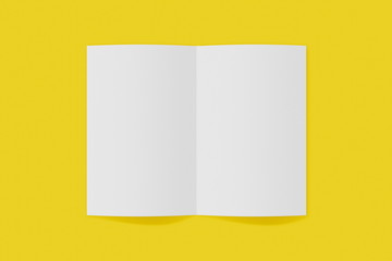 Mockup vertical booklet, brochure, invitation isolated on a yellow background with soft cover and realistic shadow. 3D rendering.