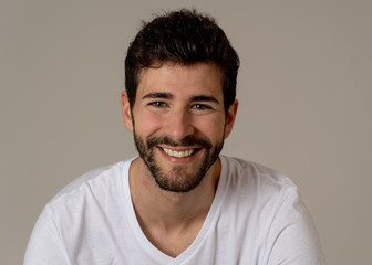 Obraz premium Fashion portrait of Attractive young manly man model posing happy and sexy for the camera