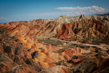Wall murals Zhangye Danxia China. Zhangye Danxia geological park, China. Situated in a canyon with beautiful rock formations, sand stone, geological layers of stone and stunning views. Zhangye, Gansu province, China. 