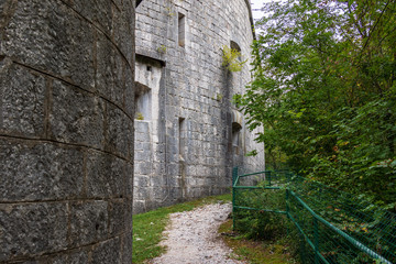 Fototapeta na wymiar Details of Fortress Wall, Fort Kluze, german: Flitscher Klause. Fortification for World War during Isonzo Front. Bovec, Gorizia, Slovenia.