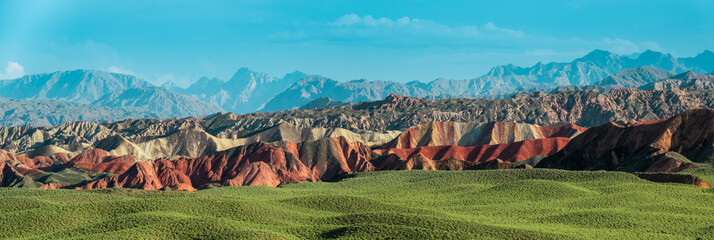 Wide panorama of Zhangye Danxia geological park in Gansu Province, China. Chinese landscape with geological layers. 