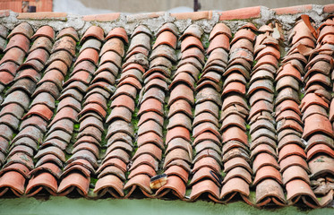 Red roof tile pattern on the house.